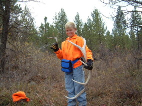 Here is Adam on opening day in Montana in 2001. He was too young to carry a rifle but we found these antlers while we were out hunting.