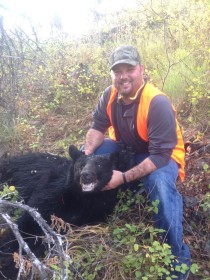 Carson's cousin KC McDonald with his 2015 fall black bear, shot with a Lilja barreled 338 Ultra Mag at 525 yards.