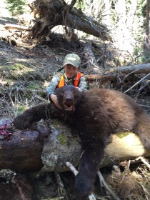 Richard McDonald's son Trenis, with his 2016 Montana spring bear, shot with a 270 Weatherby at 542 yards.