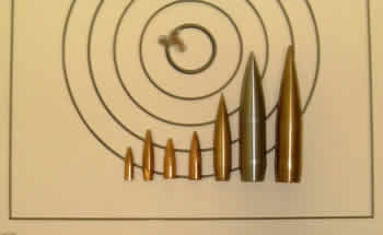 Here are several experimental bullets from a little .172 caliber to a .50 BMG bullet made from bronze, steel and conventional jacketed/lead core types. The target is a respectable 200 yard 5-shot Light Varmint benchrest target fired by a Lilja barreled 6 PPC at the 2000 Cactus Classic.