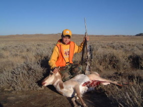 Carson with his first antelope that he shot with the 7mm-08 at about 200 yards.