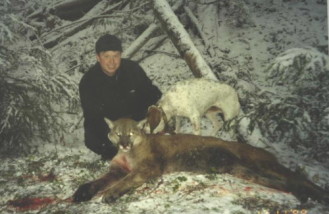 Cory Ovit with another big lion he shot in 1998.