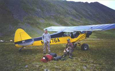 Unloading our gear at the 'airstrip' prior to hiking up and setting up a spike camp.