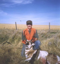 Matt Cockrell with a tall antelope buck he shot in 2002. The buck was a full 15" high.