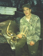 Matt Cockrell with a nice whitetail buck he shot in the 1990's.