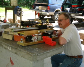 Dan shooting his unlimited class benchrest rifle in an NBRSA match in Tacoma, Washington in June of 2000. The 2" diameter barrel is chambered for a 6PPC cartridge.