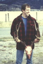 Rob Horton with a tall, heavy horned 4-point mule deer he shot in 1994 in Montana.