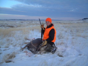 Travis with his first buck. He shot two elk before shooting this buck. This one fell to the .243 at 150 yards.