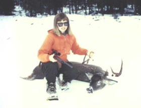 Sally with a decent 4-point whitetail around 1994. Shot with a Lilja barreled 7mm-08.